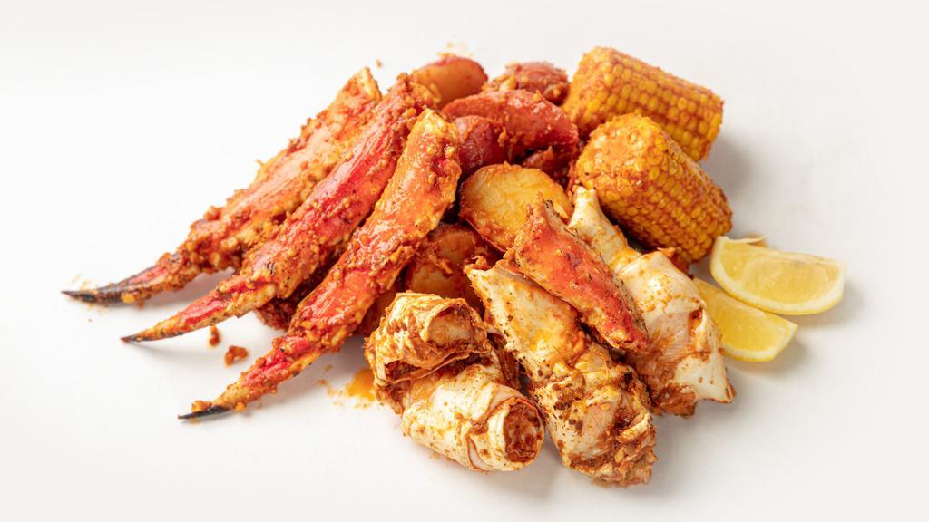 King Crab Legs (1 Lbs) · Comes with 2 corns, 5 potatoes, and 5 sausages. Whole Lb of Giant King Crab Legs.