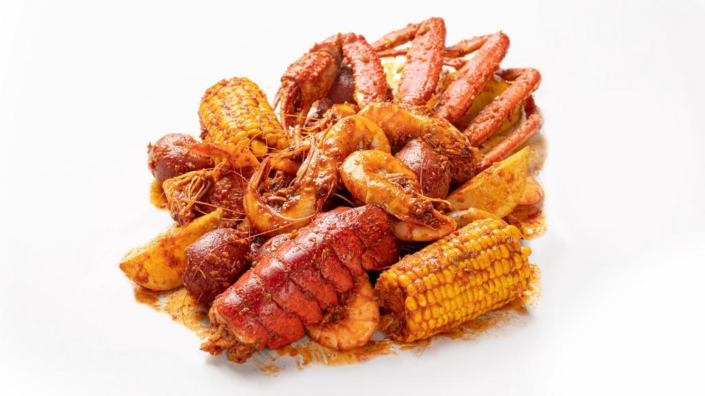 Deck Cadet'S Catch Combo L $10 Off · <Feeds 2-3 People> Lobster tails (1 tail), Snow crab legs (1 cluster), Choice of Shrimp peeled off (1 lbs) or Shrimp head on (1 lbs). Comes with 2 corns, 5 potatoes, 5 sausages.