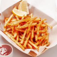 Cajun Fries · Shoestring french fries with our house-blended cajun seasoning. Served with a piece of lemon...