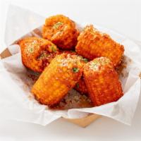 Street Daddy Corns · 6 pieces of beer batter deep fried corns with cajun seasoning, parmesan cheese, and chopped ...