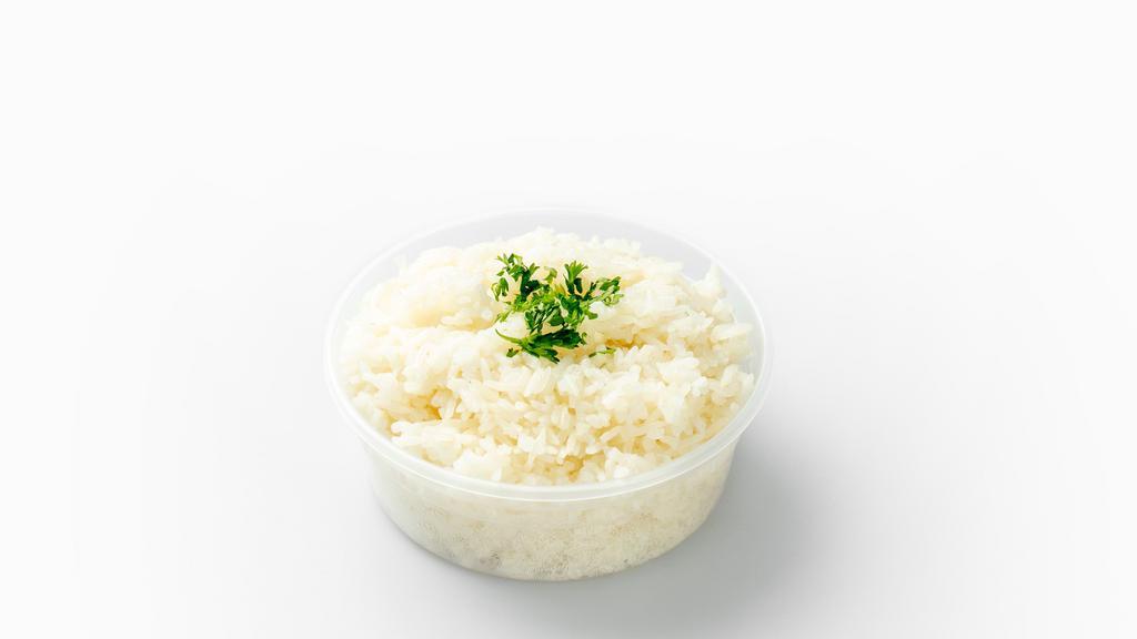 Steamed White Rice · A serving of steamed white rice.