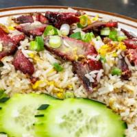 Bbq Pork Fried Rice · With bbq pork, onions, tomatoes, Green onions, and egg.
