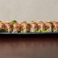Sga Roll · Albacore on spicy tuna roll with garlic sauce and garlic chip on top.