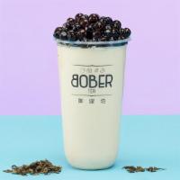 Jasmine Milk Tea · Made with our freshly brewed premium-grade jasmine green tea, floral and silky. Pictured sti...