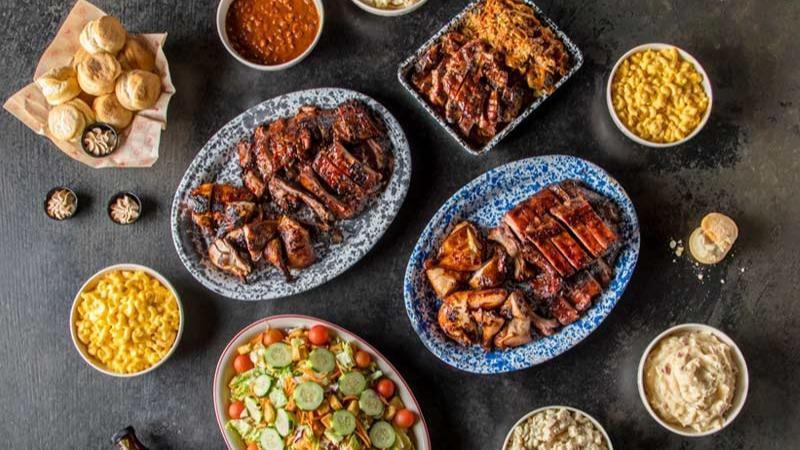 Super Feast · Served family-style for 12 or more.. Three racks of St. Louis ribs or baby back ribs+ four half BBQ chickens + your choice of two double portions of:  sausage l tri tip l pulled pork l rib tips l sliced brisket + a large tossed green salad + your choice of six super-sized sides.
