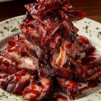 Bbq Rib Tip Appetizer · St. Louis pork rib tips marinated in our original BBQ sauce, slowly hickory smoked and finis...