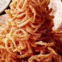 Lucille’S Onion Straws · A mountain of irresistible buttermilk battered fresh onions, seasoned and deep fried. Served...