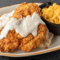 Southern Fried Chicken · Chicken breasts dipped in buttermilk, breaded, deep fried and topped with Grandpa’s pan grav...