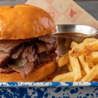 Lucille'S Bbq Tri Tip Sandwich · Our slow-smoked, certified Angus beef tri tip, hand-carved to order, piled high on a soft br...