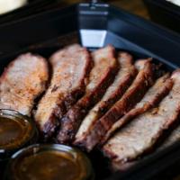 Tri Tip Per Pound · Certified Angus Beef tri tip, smoked all day until it melts in your mouth. Hand-carved to or...