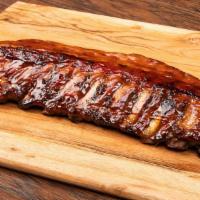 St Louis Ribs Full Rack · Rack of lean, juicy pork ribs, seasoned with Lucille’s special rub, slowly smoked, then gril...