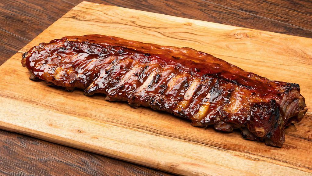 St Louis Ribs Full Rack · Rack of lean, juicy pork ribs, seasoned with Lucille’s special rub, slowly smoked, then grilled and basted with our homemade BBQ sauce.
