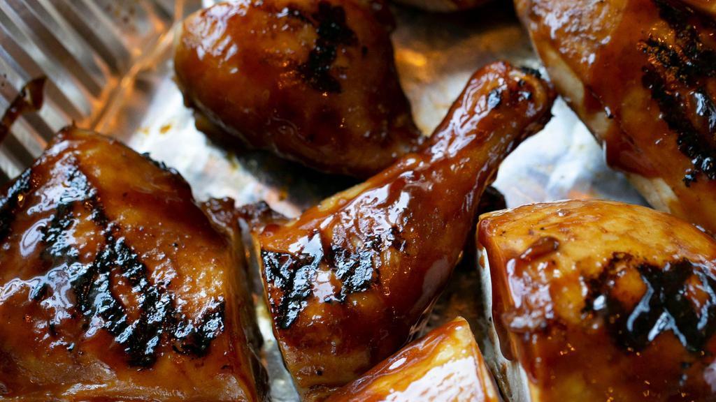 Bbq Chicken Whole · Marinated for 24 hours in apple cider and Lucille’s own. rib spice, slow-smoked to perfection and finished on the grill.