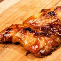 Bbq Chicken Half · Marinated for 24 hours in apple cider and Lucille’s own. rib spice, then slow-smoked to perf...