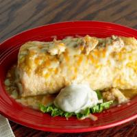 Chile Verde Burrito · Served with chunks of pork, rice, beans topped with green sauce and melted cheese.