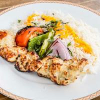 Boneless Chicken Kabob · Marinated charbroiled and boneless chicken breast and legs. Served with a charbroiled tomato...