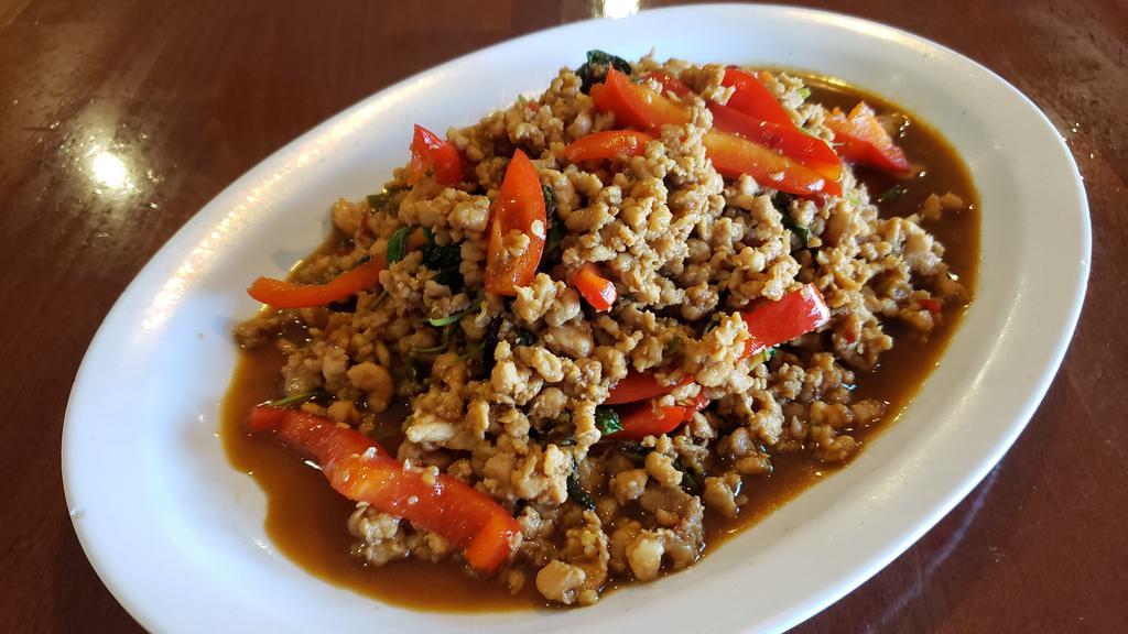Pad Ka Prow · Choice of protein (slice or ground) sauteed with garlic, red bell pepper, chili and Thai holy basil leaves. (Default meat prep is ground if not selected)