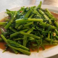 Morning Glory · Chinese water spinach sauteed with soy bean sauce, oyster sauce, and garlic.