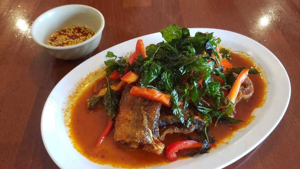 Spicy Catfish · Deep fried or steamed catfish stir fried with in-house red curry paste.