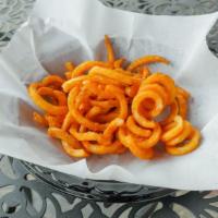 Seasoned Curly Fries · Served with heinz ketchup.