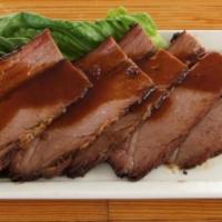 Tri-Tip · 8 oz. of smoked tri-tip, slow-cooked to perfection. Served with two sides of your choice.