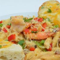 Louisiana Cajun Pasta · Penne Pasta served with fresh peppers, onions, andouille sausage, shrimp, diced chicken, ser...