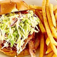Jimmy Lee'S Pulled Pork Sandwich · Slow-smoked pork, Pulled, Piled high and topped with Coleslaw