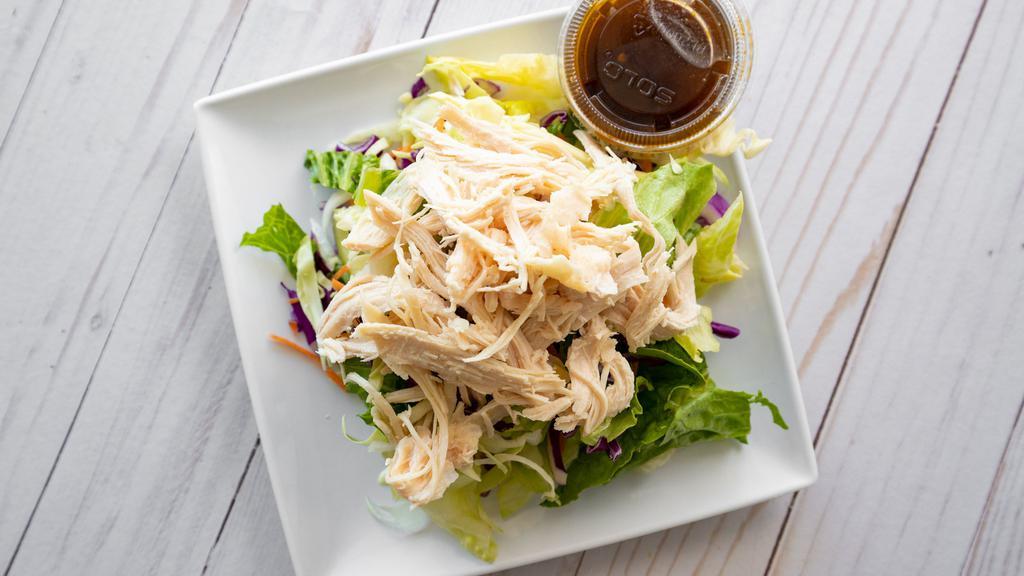 Grilled Chicken Salad · Grilled Chicken Breast, Served Atop a Mixed Green Salad.