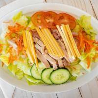 Chef'S Salad · Mixed Green Salad Served with Turkey, Ham &Two Cheeses.