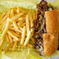 Philly Cheese Steak Sandwich · Thinly Sliced Steak Grilled with Onions and Green Peppers
Your choice of American, Cheddar, ...