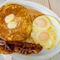 Zebra Pancake Special · Two eggs any style with bacon or sausage and two buttermilk pancakes