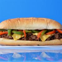 Grilled Pepper Cheesesteak · Philly cheesesteak loaded with grilled steak, melted cheese, and grilled bell peppers on a t...
