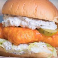 Hot Fish Sandwich · Beer battered Alaskan cod rubbed in Nashville hot spice, lettuce, pickles, tartar sauce.