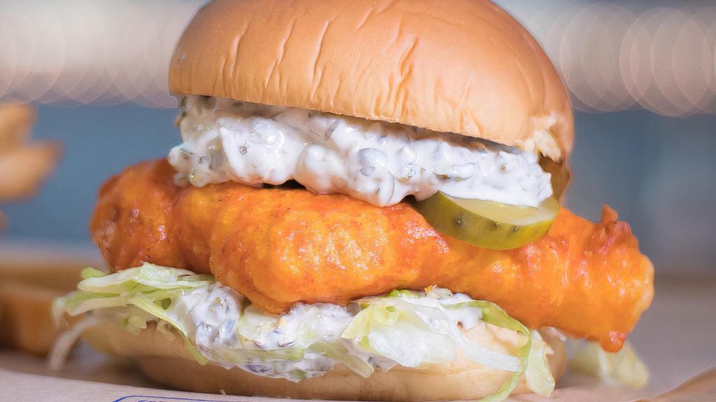 Hot Fish Sandwich · Beer battered Alaskan cod rubbed in Nashville hot spice, lettuce, pickles, tartar sauce.