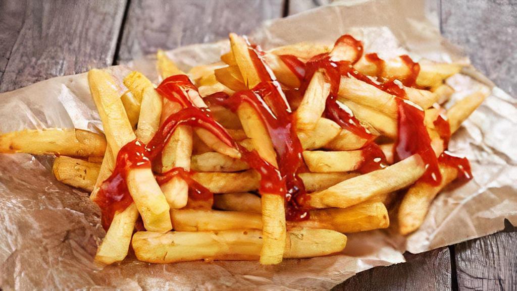 Fries & Ketchup · Crispy coated fries.