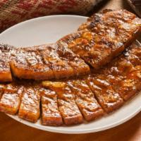 Liempo (1 Lb) · Long sliced pork belly marinated in citrus juice, soy sauce and spices then grilled to juicy...