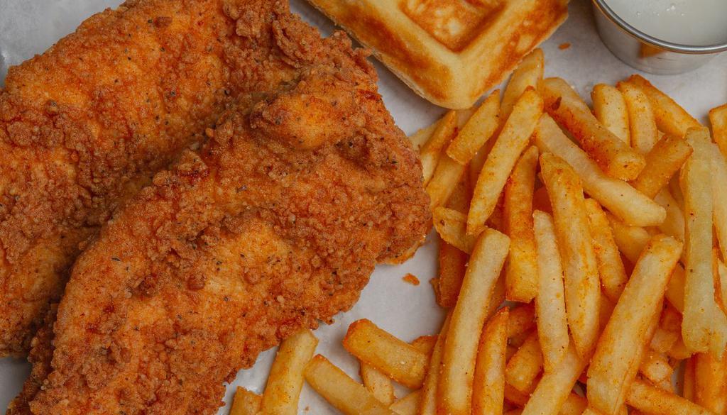 Combo #2 · Two fried chicken tenders with one waffle, fries, and a condiment of your choice on the side.