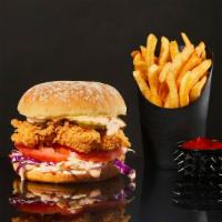 Twisted Energy Combo · Fried chicken with cheddar cheese, coleslaw, tomato, pickles and our goth chick sauce on a p...