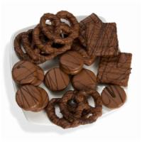 Scrumptious Snacks Assortment · 1lb. Assortment of decadent groumet snacks for sharing.  Bavarian pretzels, oreos® and graha...