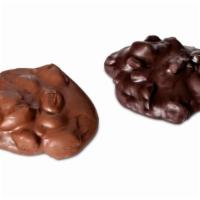Sugar Free Almond Clusters (6) · Roasted almonds covered in sugar free milk chocolate or dark chocolate.