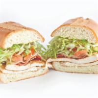 Chicken Club · Marinated chicken breast, bacon and melted jack cheese on a toasted French baguette. Include...