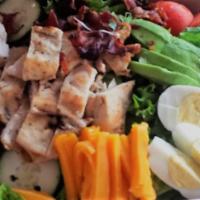 Cobb Salad · Grilled chicken breast, bacon, cheddar cheese, hard boiled egg, green leaf lettuce, tomato a...