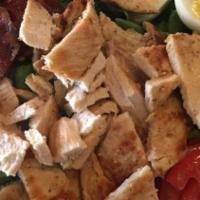 Caesar Salad · Grilled chicken breast, green leaf lettuce, parmesan cheese, homemade croutons, served with ...