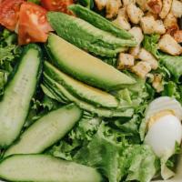 Green Salad · Green leaf lettuce, hard boiled egg, tomato, cucumber, and homemade croutons with either mar...