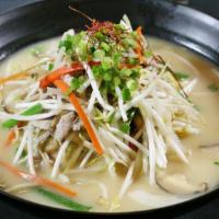 Miso Ramen · Noodles in Miso flavored broth with pork and assorted vegetables