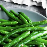 Stir-Fry String Beans · Sautéed  with garlic in our delicious brown sauce.
