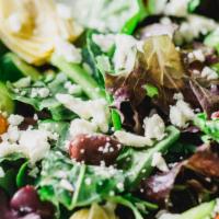 Crispy Greek · Mixed greens, feta, Kalamata olives, cucumbers, artichoke hearts, cherry tomatoes, green pep...