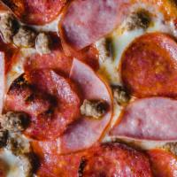 Meat Lovers Pie · Crushed tomato, mozzarella, parmesan, pepperoni, ham, Italian sausage, bacon, beef.