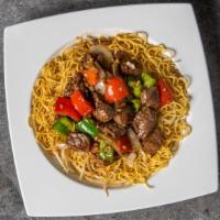 Shaken Beef With Soft Pan Fried Egg Noodles · Shaken beef with soft pan-fried egg noodles .