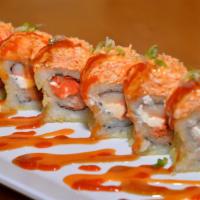 Monster · Spicy crab with deep fried spicy tuna, cream cheese and crab (E, S, H).